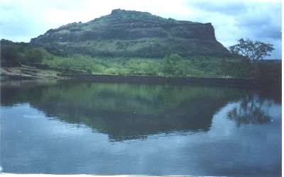 Beautiful reflection of one of the citadels in the pond of Rajmachi